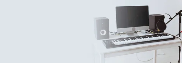 Synthesizer keyboard digital recording, home music record studio concept. Leisure and hobby.