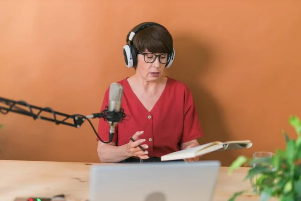 Portrait Mature Woman Wearing Headphones Talking Online Radio Station Podcast — Photo