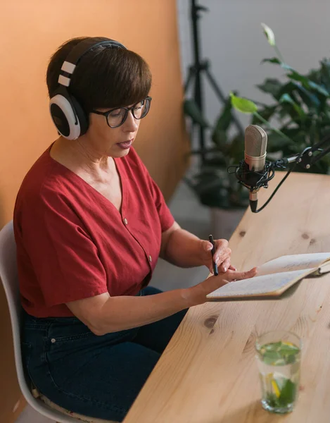 Portrait Mature Woman Wearing Headphones Talking Online Radio Station Podcast — Stock Photo, Image