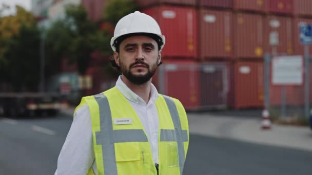 Portrait of warehouse worker in safety helmet and uniform — Stock Video