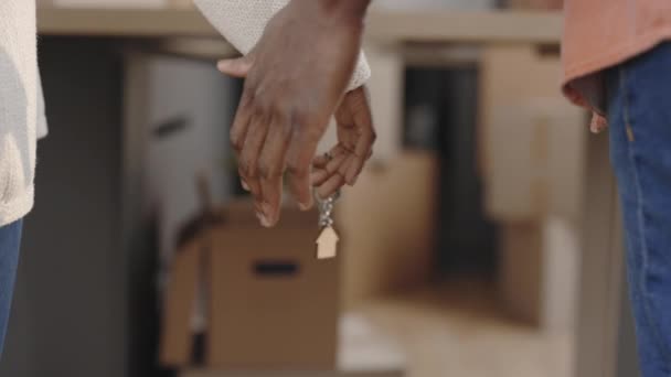 Close African American Couple Holding Hands Keys New Apartment Background — Αρχείο Βίντεο