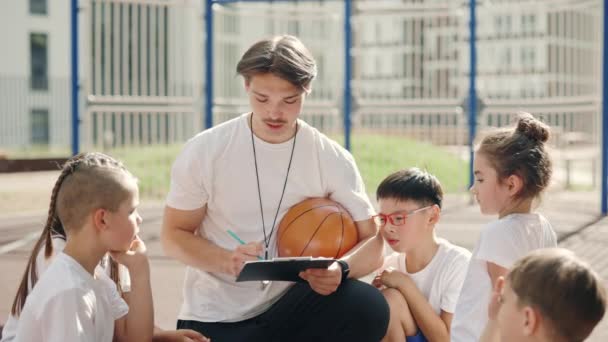 School Male Coach Explaining Game Plan Basketball Players Court Outdoor — Vídeos de Stock