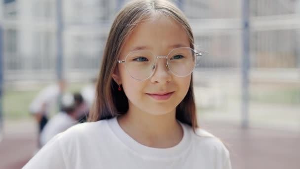 Portrait Little Asian Schoolgirl Glasses Attending Sport Classes Outdoor Coach — Stockvideo