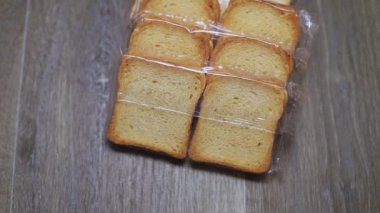 packet of rusks isolated on white. High quality FullHD footage