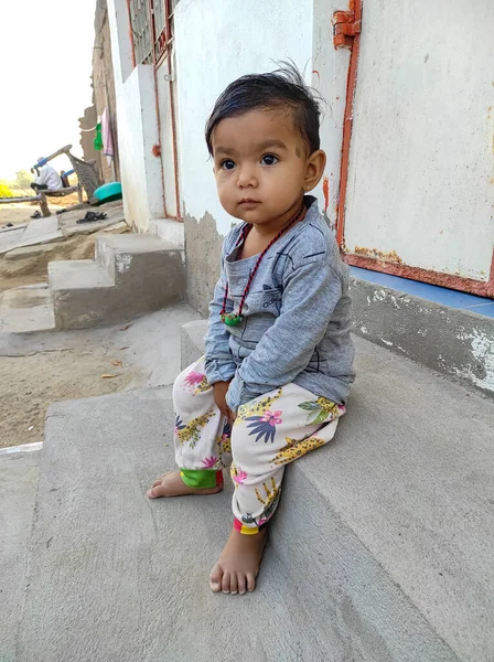 Beautiful Short Indian Village Cute Baby Girl Playing Photos Imagini stoc fără drepturi de autor