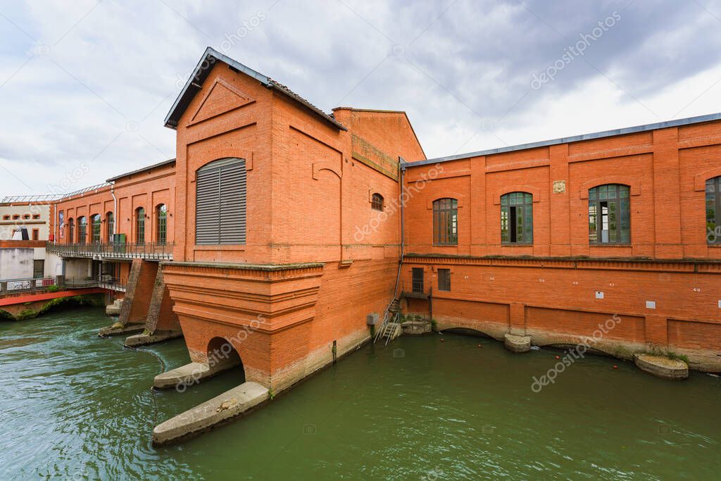 Toulouse, France. May 23, 2022. View of Le Bazacle turbine, EDF Espace, on the riverbank of the River Garonne