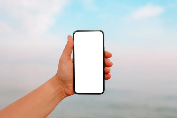 Hand Showing Blank Smart Phone Beach Sea Background White Screen — Fotografia de Stock
