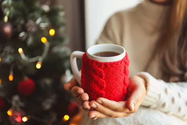 Girl Holding Knitted Red Cup Tea Her Hands Christmas Mood — Stok fotoğraf