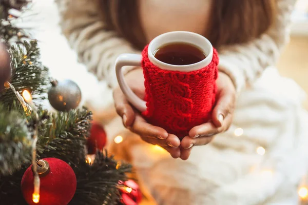 Girl Holding Knitted Red Cup Tea Her Hands Christmas Mood — Stok fotoğraf