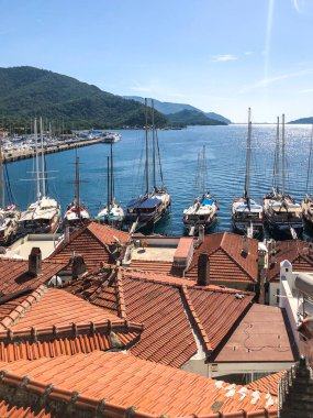 View from the mountain to the pier with yachts in the city of Marmaris.