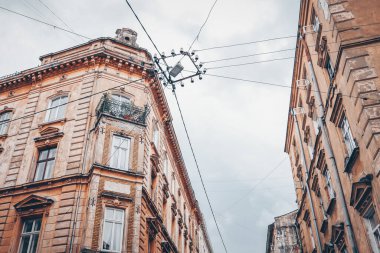 Facades of houses in Lviv, old buildings against the sky