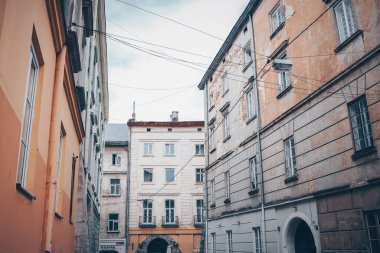Facades of houses in Lviv, old buildings against the sky