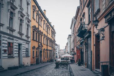 Traditional buildings in a cobblestone street in historical Old town of Lviv.