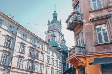 Facade of houses in Lviv, church and historical building