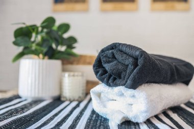 Clean stack of towels in the bathroom.