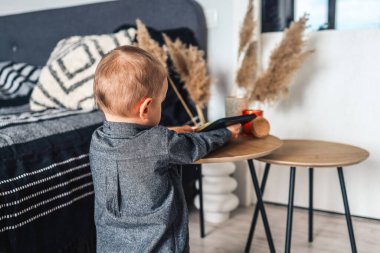 Child pray and read Bible in his room, religious concept