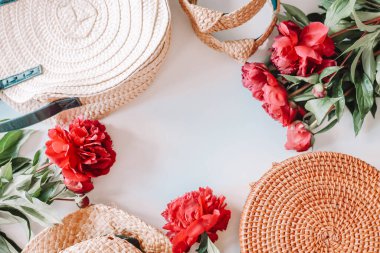 Flat lay top view wicker accessories, hat and bags