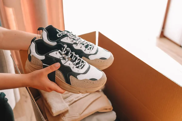 Men Sneakers Clothes Box Shopping Unpacking — стоковое фото