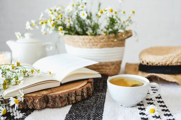 Open Book Herbal Chamomile Tea Cup Wooden Table Reading Morning — 스톡 사진