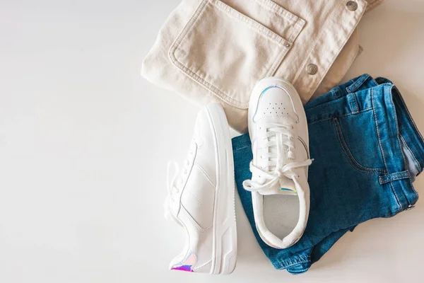 Stylish Women Clothing Flat Lay White Sneakers Jeans Jacket White — 스톡 사진