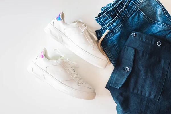 White Women Sneakers Jeans Jacket Flat Lay Top View — Stok fotoğraf