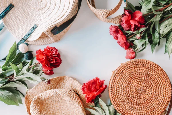 Flat lay top view wicker accessories, hat and bags