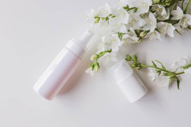 Set of cosmetic skin care products on a white background. Place for your logo