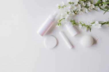 Set of cosmetic skin care products on a white background. Place for your logo