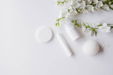 Set of cosmetic skin care products on a white background. Place for your logo