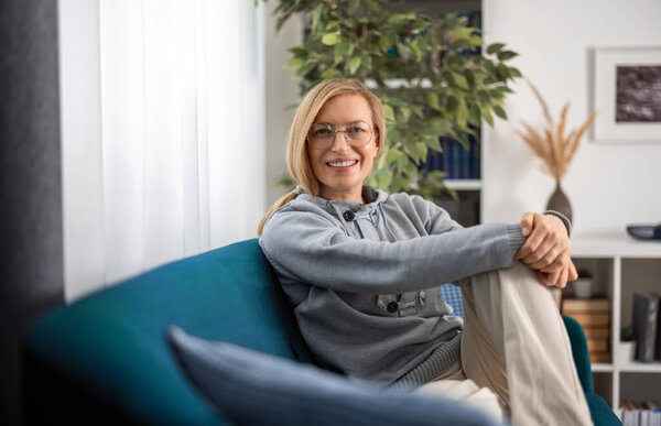 Portrait of woman on couch