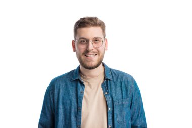 Portrait of smiling young man in trendy eyeglasses over white background. Caucasian handsome male with positive emotions posing in studio.