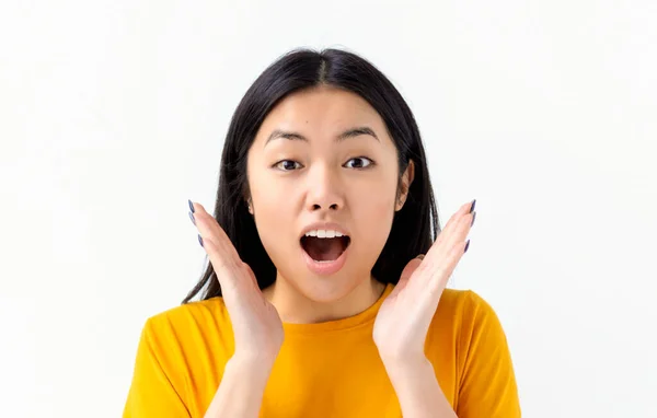 Portrait Thrilled Asian Woman Open Mouth Holding Hands Face Isolated — Foto de Stock