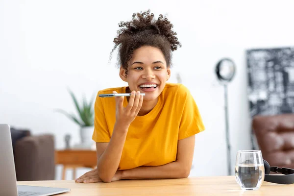 Young African American Woman Sending Voice Message Using Mobile Phone —  Fotos de Stock