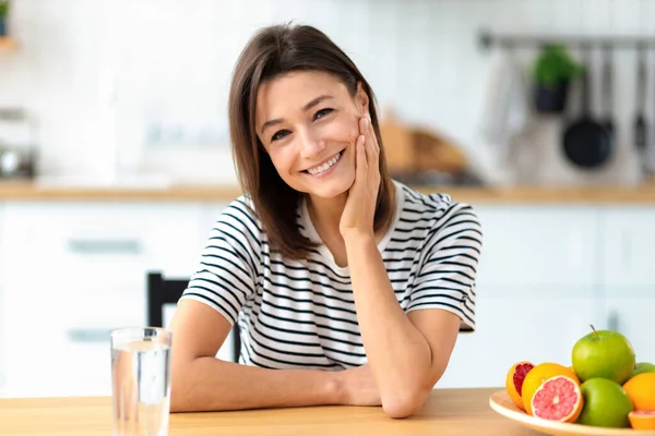 Woman feeling fresh and clean in morning light