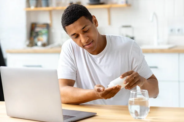 Portrait Student Freelancer Man Taking Pills Headache Vitamins Mental Activity — Stockfoto