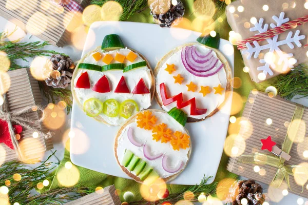 Christmas pancake healthy breakfast shaped tree ornaments with fresh vegetables. Top view, Flatly.Xmas fun food for kids, funny breakfast idea healthy food, diet