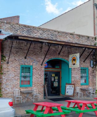 NEW ORLEANS, LA, USA - AUGUST 14, 2022: Front of El Gato Negro (The Black Cat) Restaurant on French Market Place in the French Quarter
