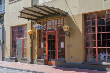 NEW ORLEANS, LA, USA - AUGUST 20, 2022: Front of G.W. Fins Restaurant on Bienville Street in the French Quarter