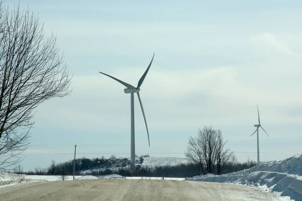 Windmill generators, view from road. Wind turbine farm power generators — Stock Photo, Image