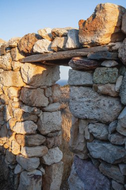 Abandoned house on the coast of Milos Island, Cyclades, Greece