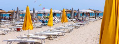 Traditional beach chair and umbrella. Rimini, Italy, . High quality photo