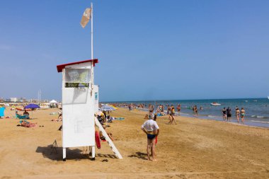 White Lifeguard tower in summer. Rimini, Italy. High quality photo