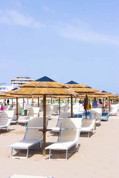 Traditional beach chair and umbrella. Rimini, Italy, . High quality photo