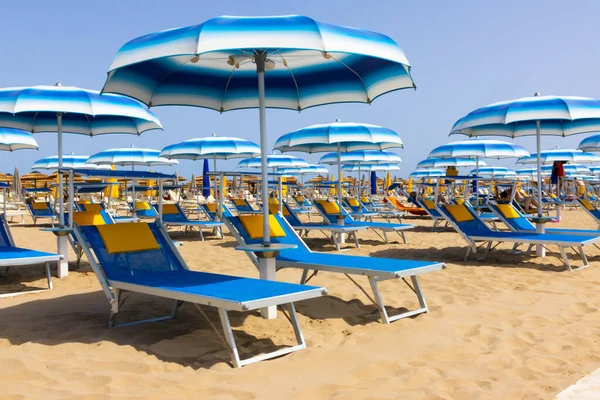 Traditional beach chair and umbrella. Rimini, Italy, . High quality photo