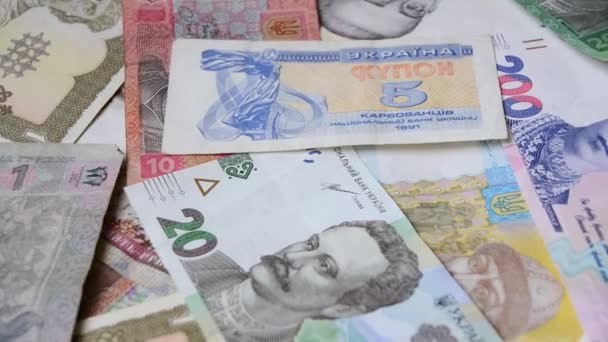 乌克兰Hryvnia 很多钱的背景 不同时间的乌克兰货币 — 图库视频影像
