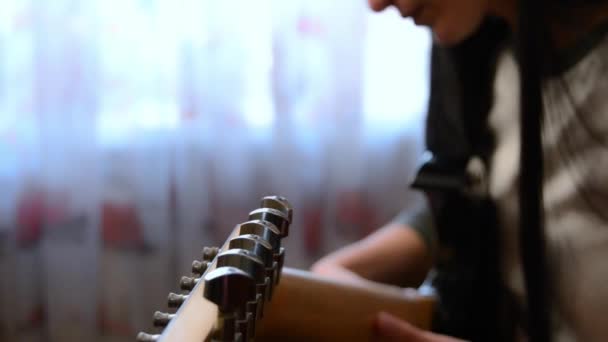 Closeup Unrecognizable Girl Hands Tuning Guitar Young Woman Checking Pegs — Stock video