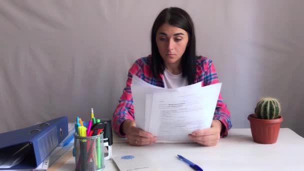 Stressed Young Caucasian Business Lady Feeling Nervous Doing Paperwork Anxious — Video