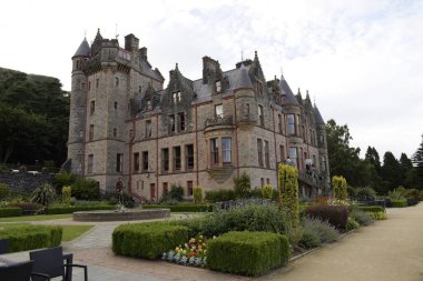 cavehill country park, belfast castle, northern ireland, united kingdom - august 8, 2022 : renowned historic castle at cavehill country park