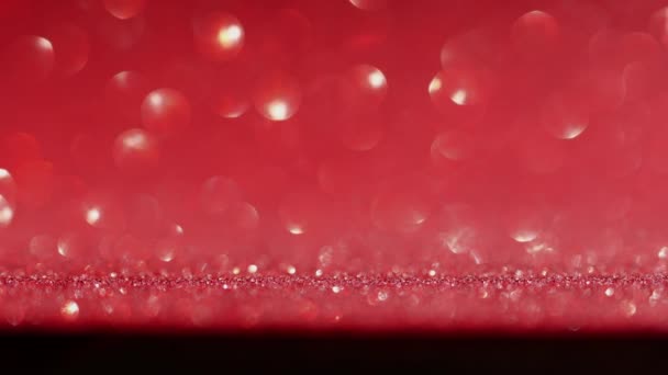 Moving red defocused bokeh lights background Christmas, Valentines Day concept — Stock Video