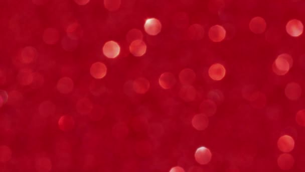 Movimiento rojo desenfocado bokeh luces fondo Navidad, San Valentín concepto del día — Vídeos de Stock